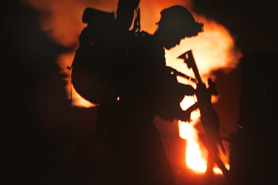 Marine-reloads-in-Helmand.jpg