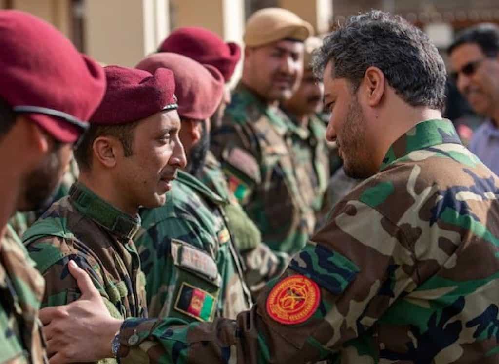 Yasin Zia greeting Afghan troops